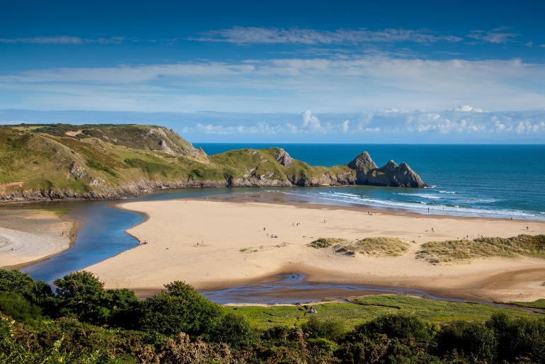 A spectacular shoreline of sand dunes, salt marsh and three limestone cliffs.