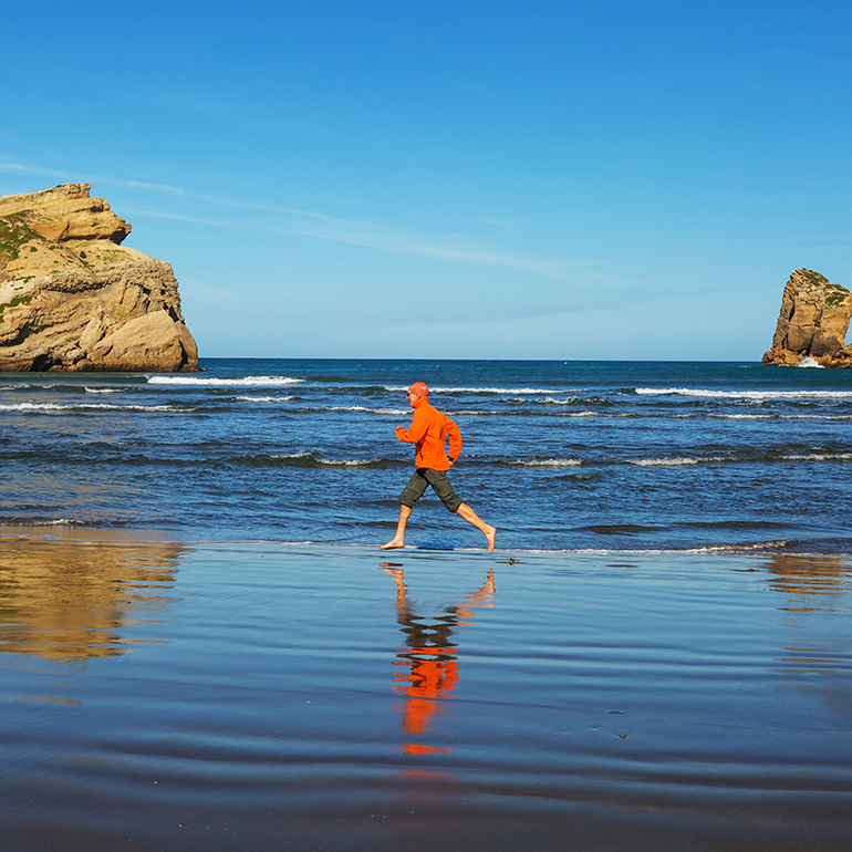 A man running on beach